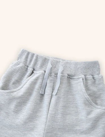Pantaloncini in cotone con denti di dinosauro