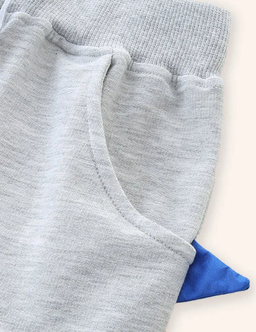 Pantaloncini in cotone con denti di dinosauro