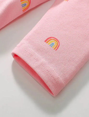 Polojurk met regenboog stippen