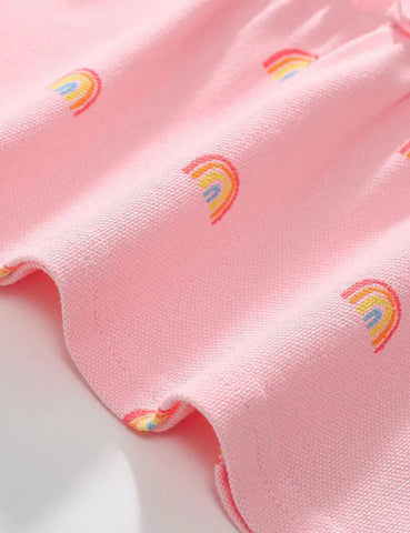Polojurk met regenboog stippen