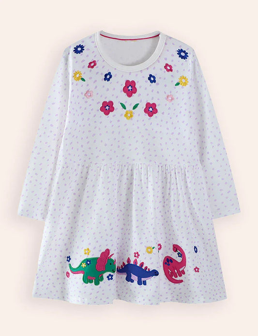 Vestido de manga larga con apliques de dinosaurio