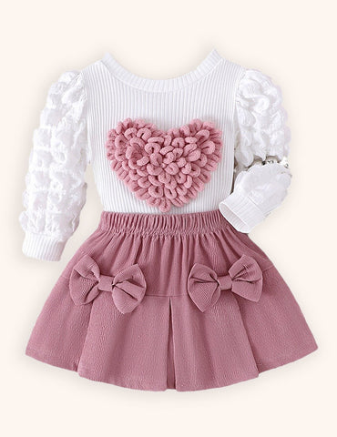 Conjunto de top con mangas de burbujas y falda con lazo para el día de San Valentín