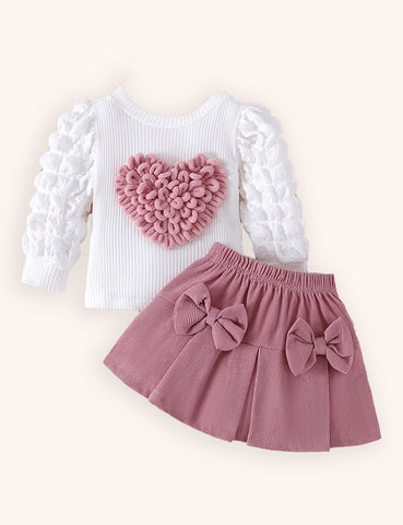Conjunto de top con mangas de burbujas y falda con lazo para el día de San Valentín